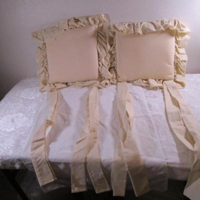 2 ruffled chair pads
