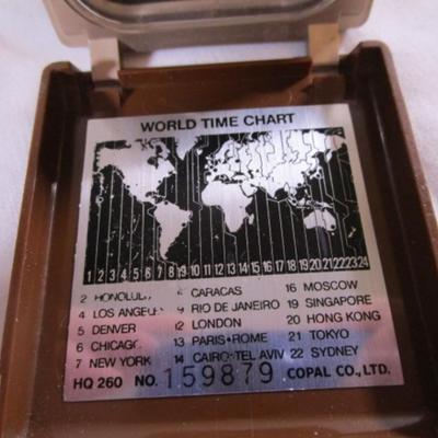 Vintage Copal travel alarm clock with world time chart