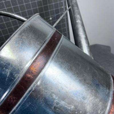 2 Watering Cans