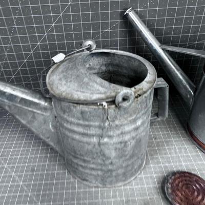 2 Watering Cans