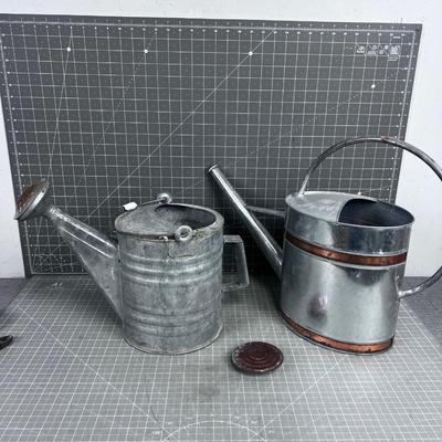 2 Watering Cans