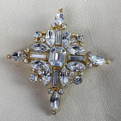 TRIFARI STARBURST PIN BROOCH CRYSTAL RHINESTONES IN GOLD TONE