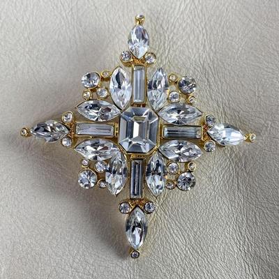 TRIFARI STARBURST PIN BROOCH CRYSTAL RHINESTONES IN GOLD TONE