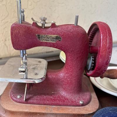 Vintage stitch mistress hand crank sewing machine & Cobalt 40's child dishes