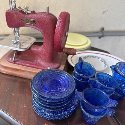 Vintage stitch mistress hand crank sewing machine & Cobalt 40's child dishes