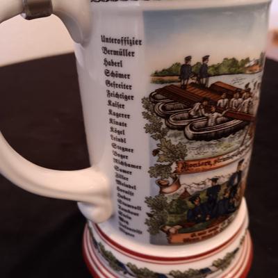 2 GERMAN STEINS WITH PEWTER TOPS