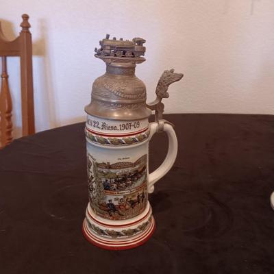 2 GERMAN STEINS WITH PEWTER TOPS