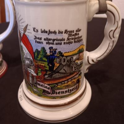 2 GERMAN STEINS WITH PEWTER TOPS