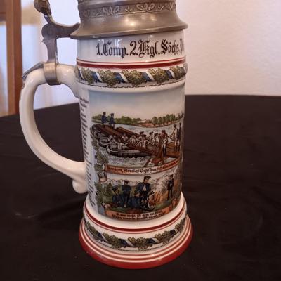 2 GERMAN STEINS WITH PEWTER TOPS