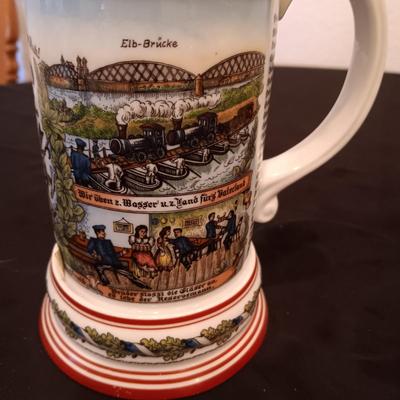 2 GERMAN STEINS WITH PEWTER TOPS