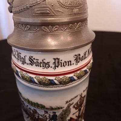 2 GERMAN STEINS WITH PEWTER TOPS