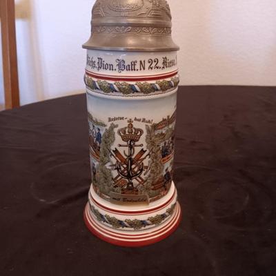 2 GERMAN STEINS WITH PEWTER TOPS