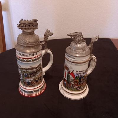 2 GERMAN STEINS WITH PEWTER TOPS