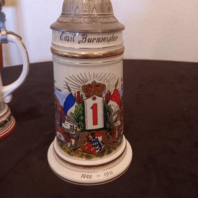 2 GERMAN STEINS WITH PEWTER TOPS