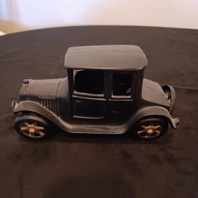 CAST IRON AND STAINED GLASS ANTIQUE CARS
