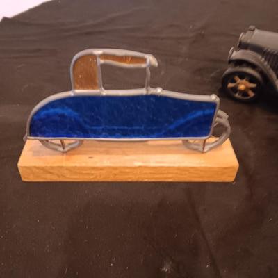 CAST IRON AND STAINED GLASS ANTIQUE CARS