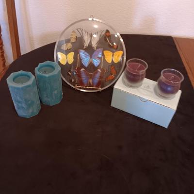 GENUINE BUTTERFLIES DISPLAYED IN A CURVED GLASS AND METAL RIMMED FRAME PLUS PARTYLITE CANDLES