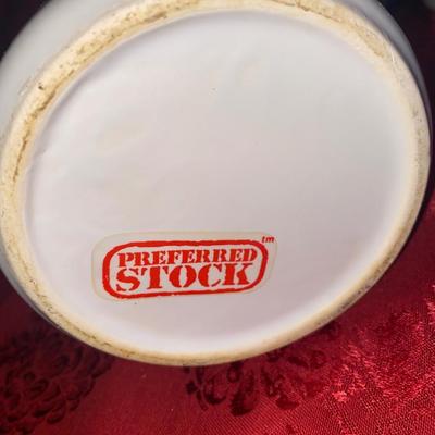 PREFERRED STOCK, CANISTERS AND LARGE PLASTIC CANISTER
