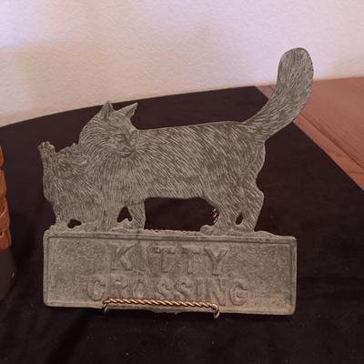 CAT HAND PAINTED ON A ROCK, METAL CAT CROSSING SIGN AND A LONGABERGER BASKET