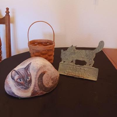 CAT HAND PAINTED ON A ROCK, METAL CAT CROSSING SIGN AND A LONGABERGER BASKET