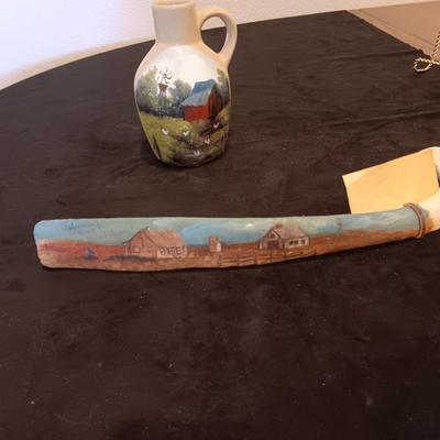 HAND PAINTED CLAY JUG AND WYOMING BACK SCRATCHER MADE FROM AN ANIMAL BONE