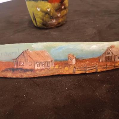 HAND PAINTED CLAY JUG AND WYOMING BACK SCRATCHER MADE FROM AN ANIMAL BONE