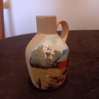 HAND PAINTED CLAY JUG AND WYOMING BACK SCRATCHER MADE FROM AN ANIMAL BONE