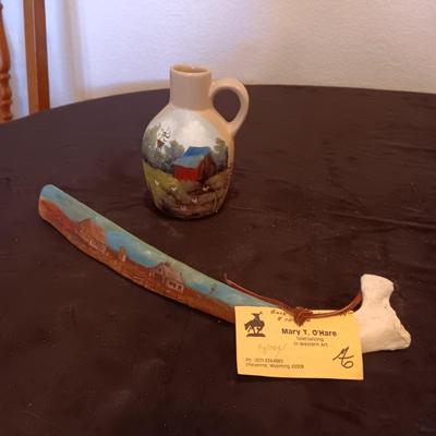 HAND PAINTED CLAY JUG AND WYOMING BACK SCRATCHER MADE FROM AN ANIMAL BONE