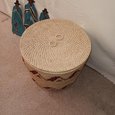 STEEL NATIVE AMERICANS WALL HANGING AND A LARGE WEAVED BASKET WITH A LID