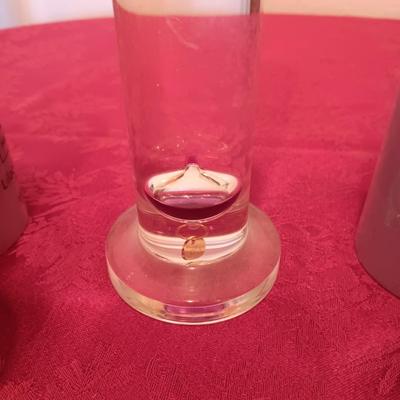GALILEO THERMOMETER AND SEVERAL CANDLES