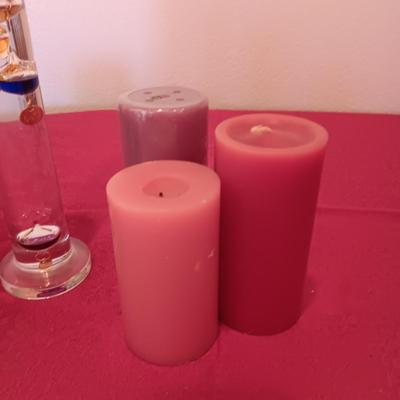 GALILEO THERMOMETER AND SEVERAL CANDLES