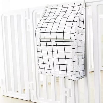 Sale Photo Thumbnail #253: 16" x 7" x 4.7"

This hanging storage basket organizer is designed in a black and white windowpane pattern. It has 7 compartments, featuring a thickened base, waterproof material, rope for hanging, wire rim, and a lidded design. Made of cotton, it is fold