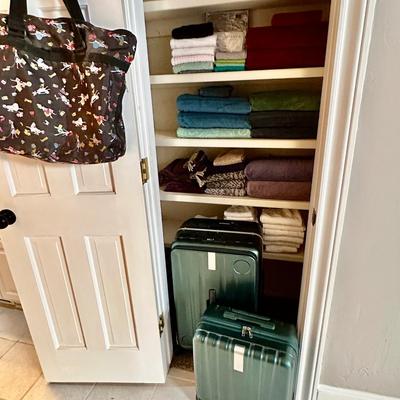 Bathroom Towles and Travel suitcases