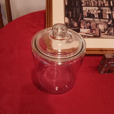 SIGNED "THE APOTHECARY" FRAMED PICTURE AND CONTAINERS PLUS AN APOTHECARY STORE MADE FROM A BRICK