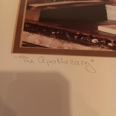 SIGNED "THE APOTHECARY" FRAMED PICTURE AND CONTAINERS PLUS AN APOTHECARY STORE MADE FROM A BRICK