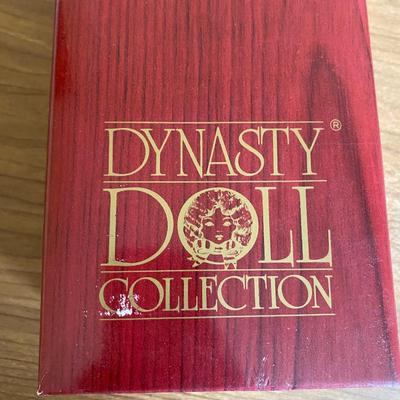 LOT 83F: (5) Small Vintage Dolls and (5) Books About Dolls