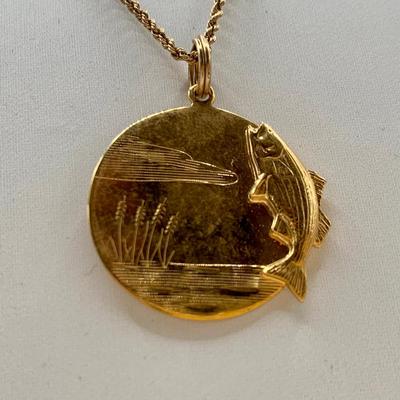 LOT 101 J: Unique Gold Tone Fish & Etched Lake Pendant