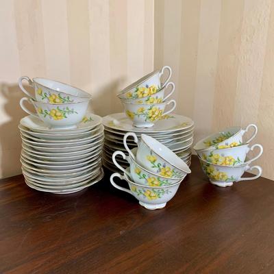 LOT 110 K: White w/ Yellow Floral Motif Tea Cups w/ Plates & Snack Plates Set