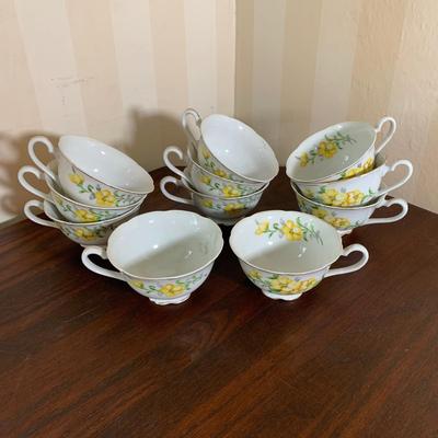 LOT 110 K: White w/ Yellow Floral Motif Tea Cups w/ Plates & Snack Plates Set