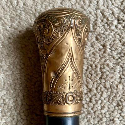 LOT 115 L: Antique 1874 Engraved Gold Plated Handle Walking Cane w/ Ebony Wood Shaft