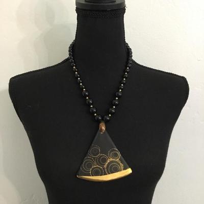 Vintage black beaded necklace with triangle, ceramic gold gilding pendant