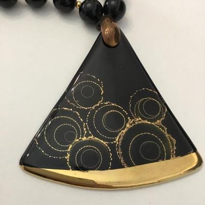 Vintage black beaded necklace with triangle, ceramic gold gilding pendant