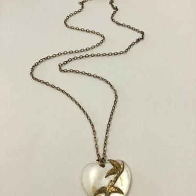 Vintage mother of pearl heart pendant on vintage gold tone chain necklace