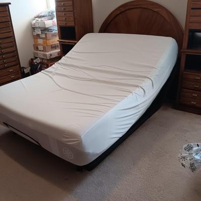 QUEEN SEALY EASE POWER ADJUSTABLE BED WITH CLEAN TEMPURPEDIC MATTRESS, LIGHTED BASSETT HEADBOARD AND WALL UNIT PLUS HANDMADE QUILT AND...