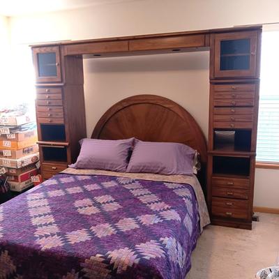 QUEEN SEALY EASE POWER ADJUSTABLE BED WITH CLEAN TEMPURPEDIC MATTRESS, LIGHTED BASSETT HEADBOARD AND WALL UNIT PLUS HANDMADE QUILT AND...