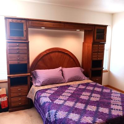 QUEEN SEALY EASE POWER ADJUSTABLE BED WITH CLEAN TEMPURPEDIC MATTRESS, LIGHTED BASSETT HEADBOARD AND WALL UNIT PLUS HANDMADE QUILT AND...