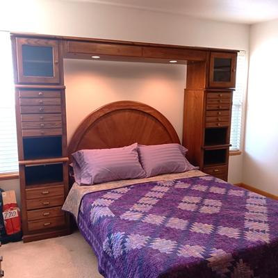 QUEEN SEALY EASE POWER ADJUSTABLE BED WITH CLEAN TEMPURPEDIC MATTRESS, LIGHTED BASSETT HEADBOARD AND WALL UNIT PLUS HANDMADE QUILT AND...