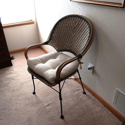 SIGNED AND NUMBERED PICTURE OF KAFFIR LILY AND A WICKER ARM CHAIR