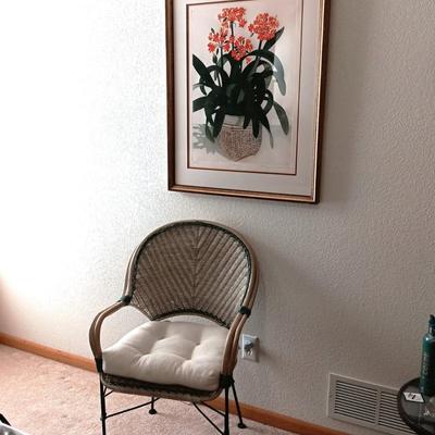 SIGNED AND NUMBERED PICTURE OF KAFFIR LILY AND A WICKER ARM CHAIR