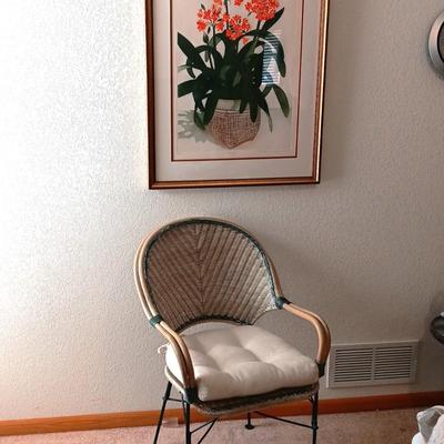 SIGNED AND NUMBERED PICTURE OF KAFFIR LILY AND A WICKER ARM CHAIR